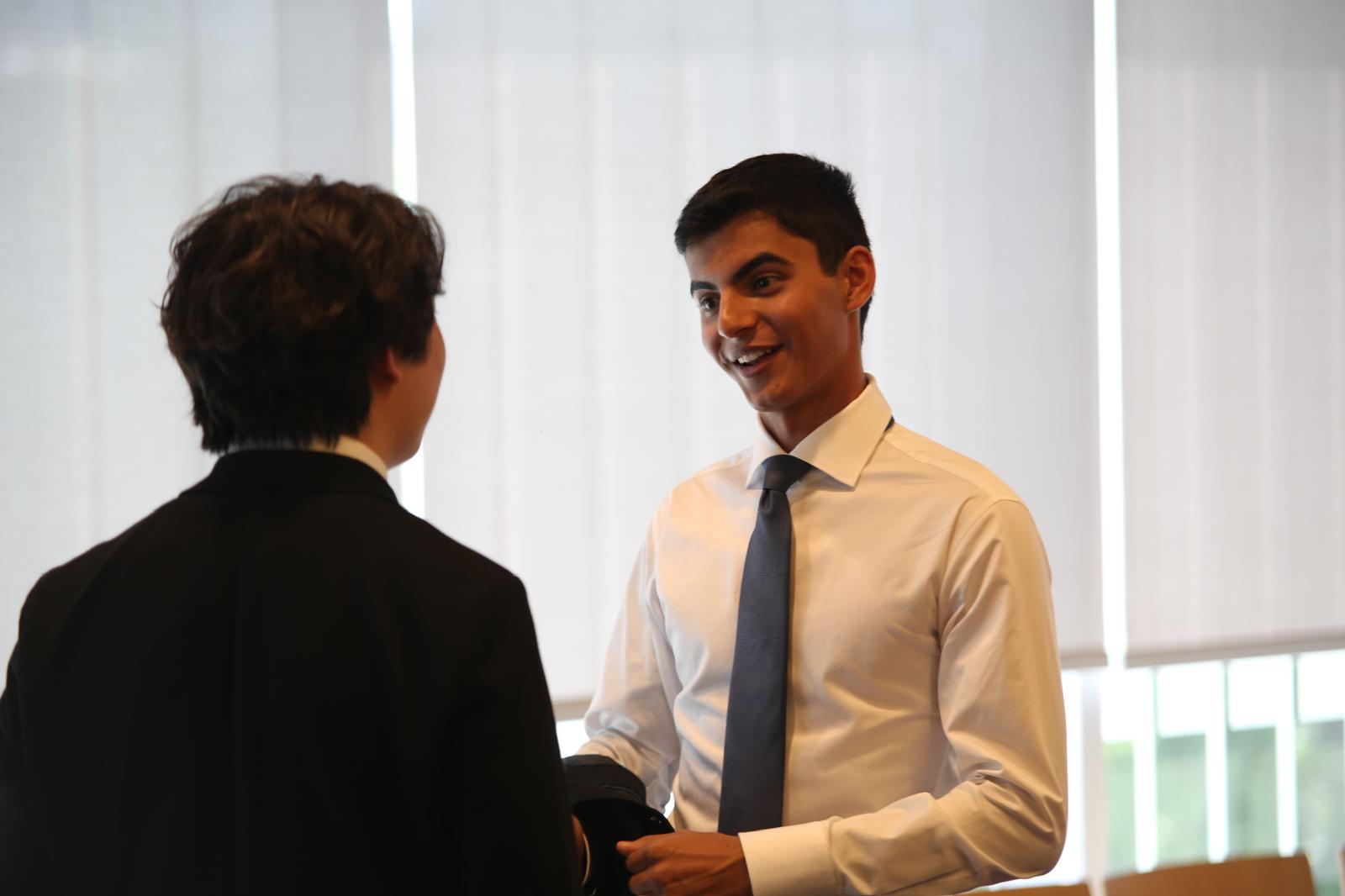 Shaking hands with a client after the session