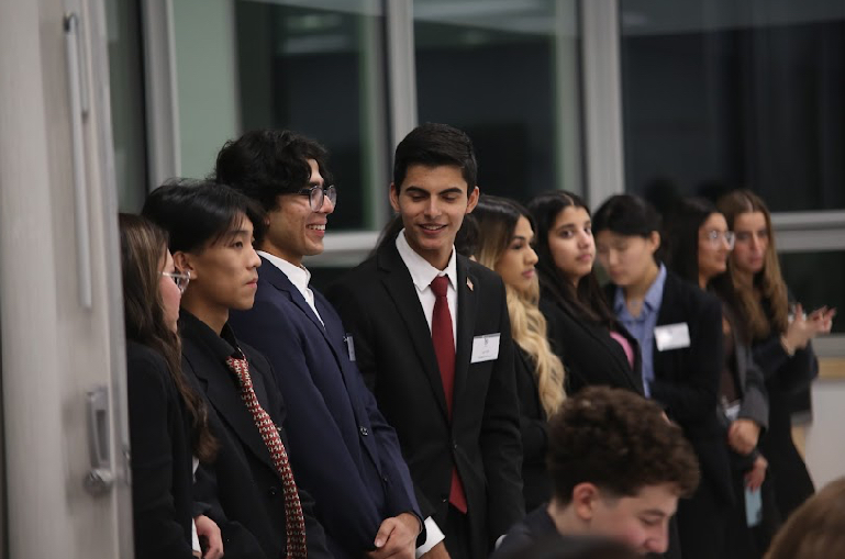 Waiting with delegates before opening ceremonies